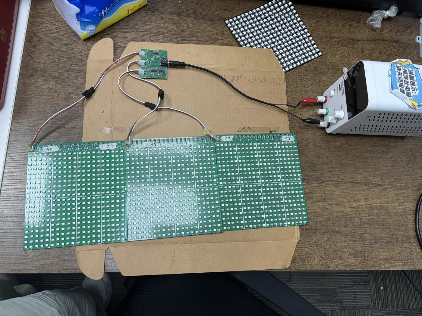 Several light screen panels chained together into one display.