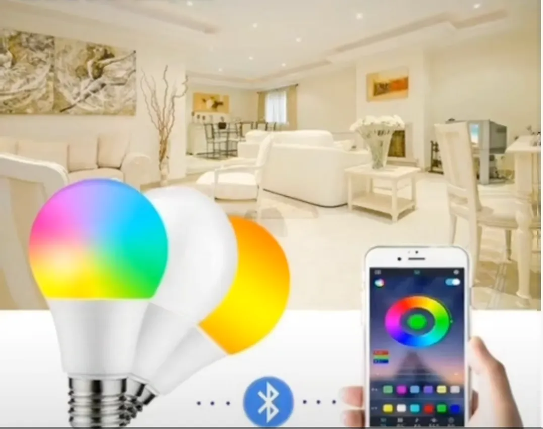 Three LED bulbs shown in full colour, cool white and warm white, next to a phone displaying the app's colour wheel, with a Bluetooth symbol linking them.